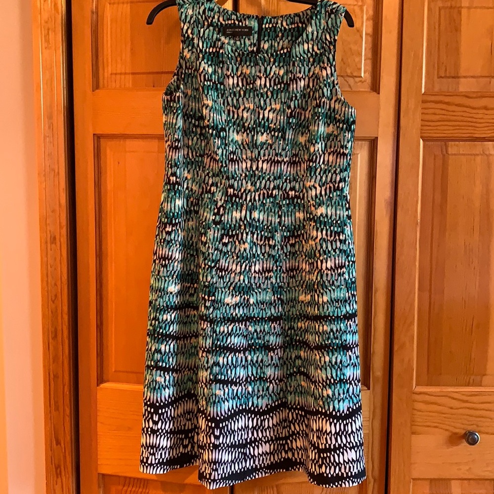 Colorful green, black, white dress.